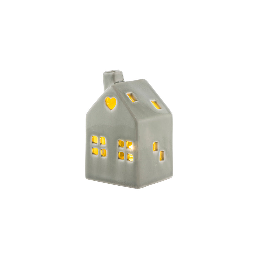 Grått porselenshus med hjerte og LED-lys, fra Porsgrunds Porselænsfabrik, gir et varmt lys og julestemning, perfekt for dekorasjonen - PP Jul Mini Hus M/ LED Lys 3pk.