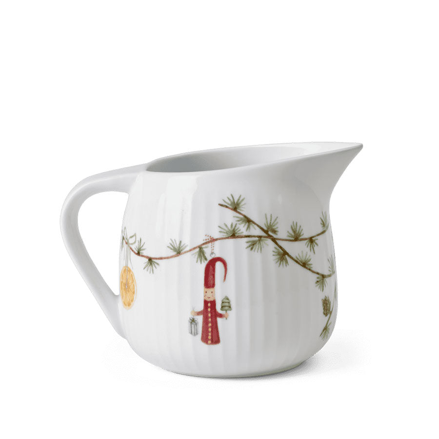 Stilrent Kähler Hammershøi sausenebb med julemotiver av nisse og julepynt, ideelt for servering av saus til festlige anledninger.