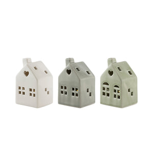Tre porselenshus med LED-lys fra Porsgrunds Porselænsfabrik, perfekte for juledekorasjon, skaper en koselig atmosfære med varm belysning - PP Jul Mini Hus M/ LED Lys 3pk.