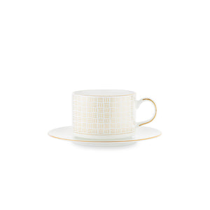 Porsgrund Porselænsfabrik Vivienne Gull Tekopp med skål, elegant design i benporselen med detaljert gulldekor.