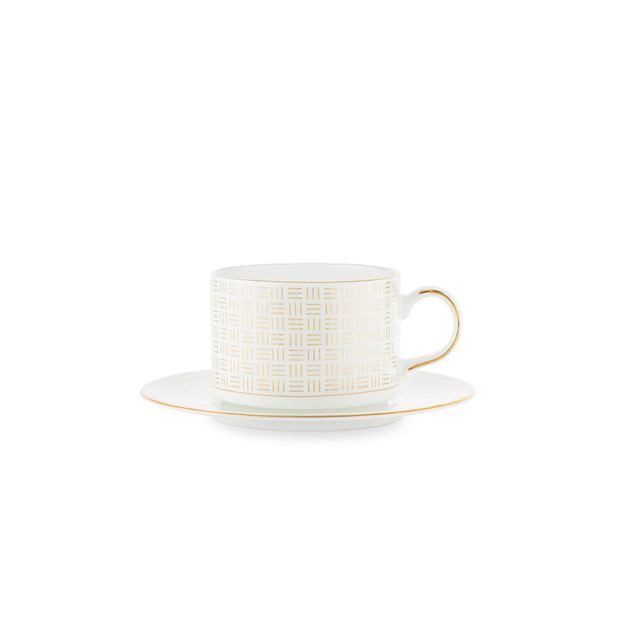 Porsgrund Porselænsfabrik Vivienne Gull Tekopp med skål, elegant design i benporselen med detaljert gulldekor.