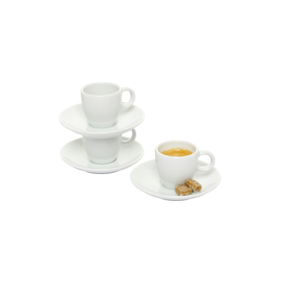 Porsgrunds Porselænsfabrik Sense Espressokopp & Skål 6cl med espresso og småbiter, tre kopper stablet på hverandre.