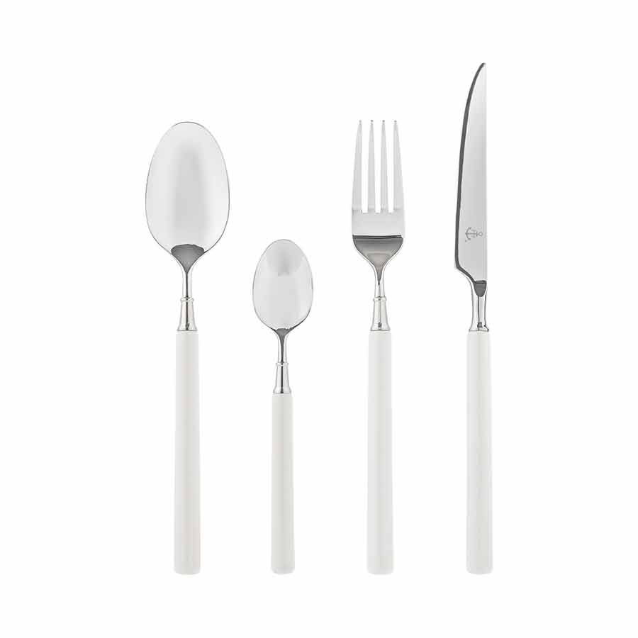 Elegant porselen bestikksett fra Porsgrunds Porselænsfabrik bestående av en spiseskje, teskje, gaffel, og kniv, perfekt for både hverdag og fest.