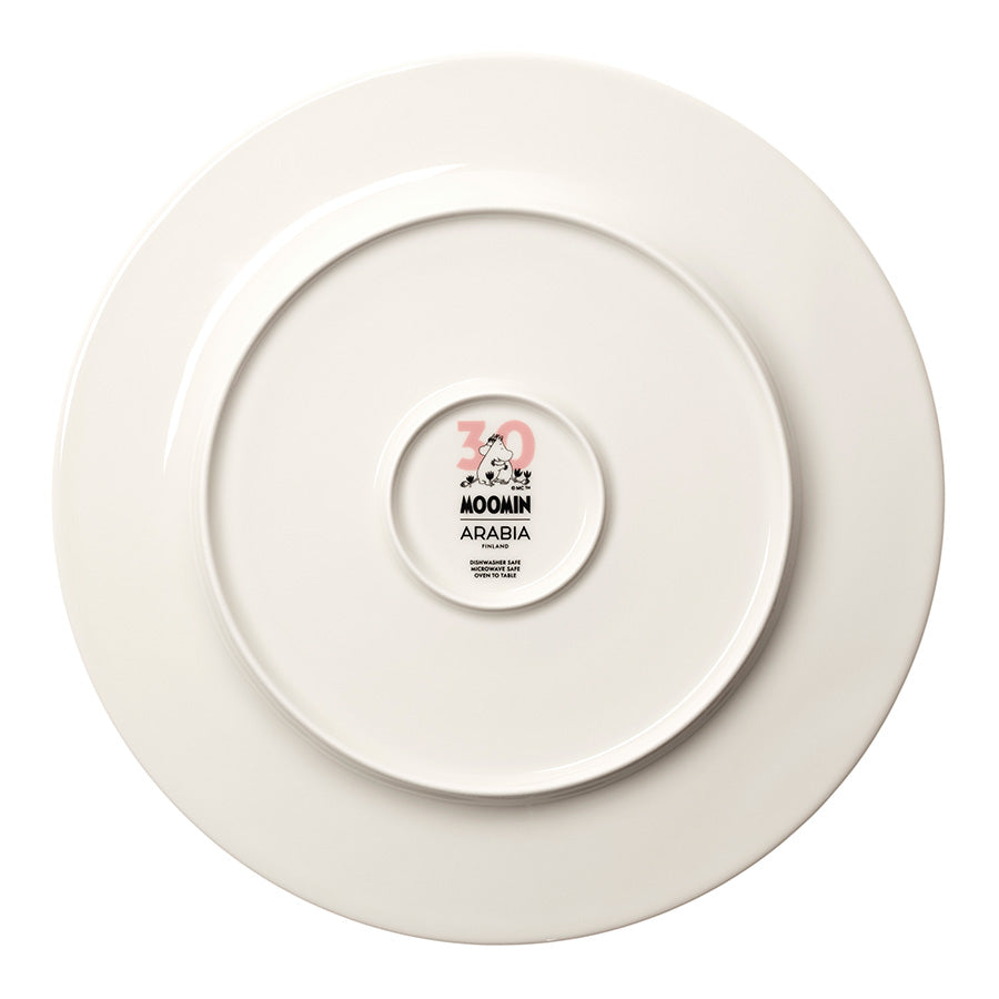 Bakside av Moomin Mummi serveringsfat i 30 cm, med logo og informasjon om produktet fra ARABIA.