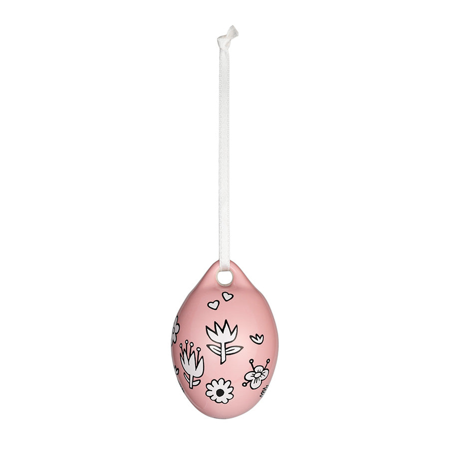 Keramisk Moomin påskeegg i rosa med blomsterdesign, ideelt for vårdekor og påskefeiring.