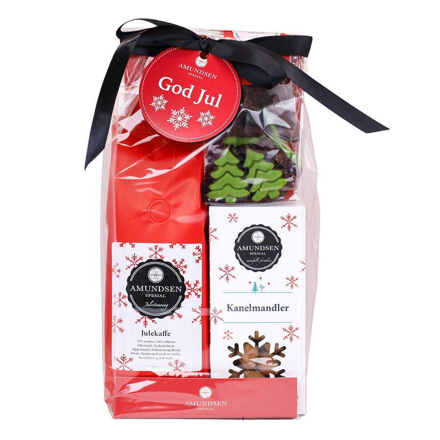 Amundsen Gavepose Julekaffe, Kanelmandler & Skjokolade m/ Marsipan innpakket i cellofan med silkebånd og 'God Jul'-anheng. Inkluderer 200 g julekaffe, kanelmandler og sjokolade.