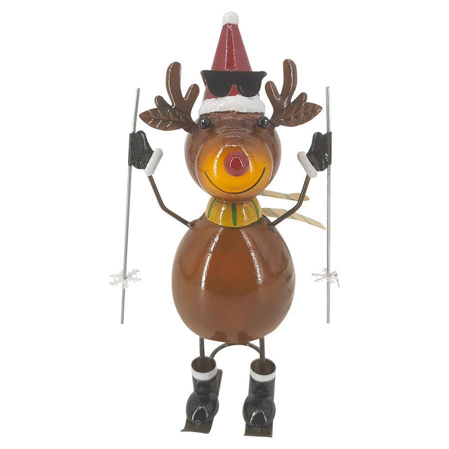 Christiania 1739 Julekolleksjon Figur Elg På Ski 30cm, en morsom julefigur av elg på ski laget i metall, med vinterklær, som sprer julestemning.