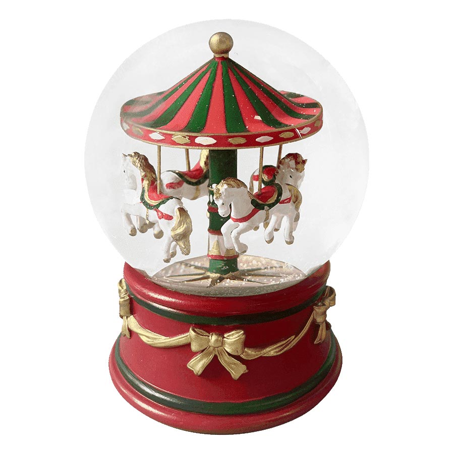 Christiania 1739 Julekolleksjon glasskule med karusellmotiv, 15 cm høy, dekorert med julefarger og gullsløyfer. Vakker snøkule med hvite hester omgitt av snø, perfekt som pynt til jul.