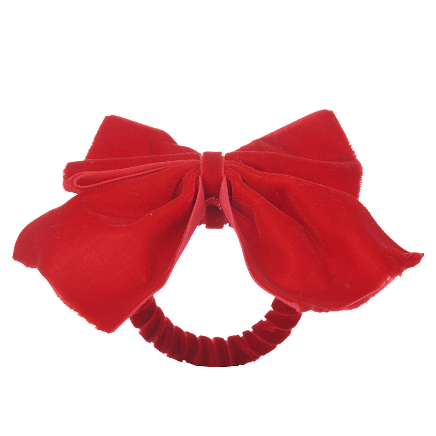 Elegant rød serviettring fra Christiania 1739 Julekolleksjon, dekorert med myk sløyfe, perfekt for juledekoren.