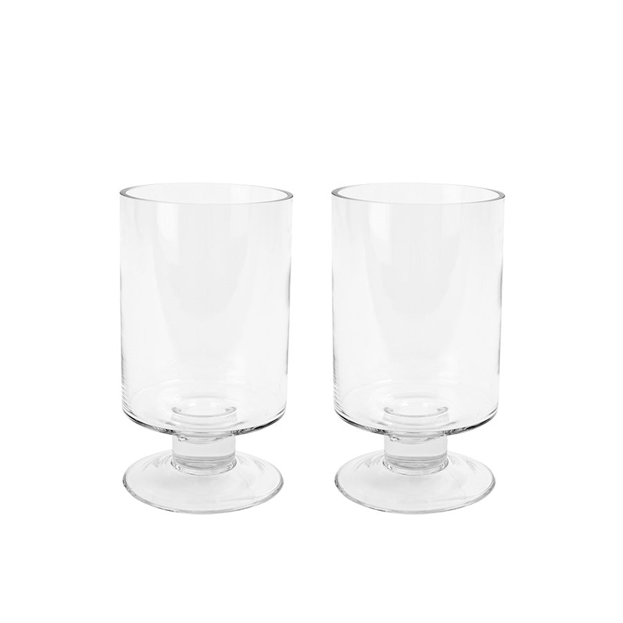 To elegante stormlykter fra Christiania 1739 i klart glass, perfekte for å skape stemning både innendørs og utendørs.