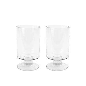 To elegante stormlykter fra Christiania 1739 i klart glass, perfekte for å skape stemning både innendørs og utendørs.