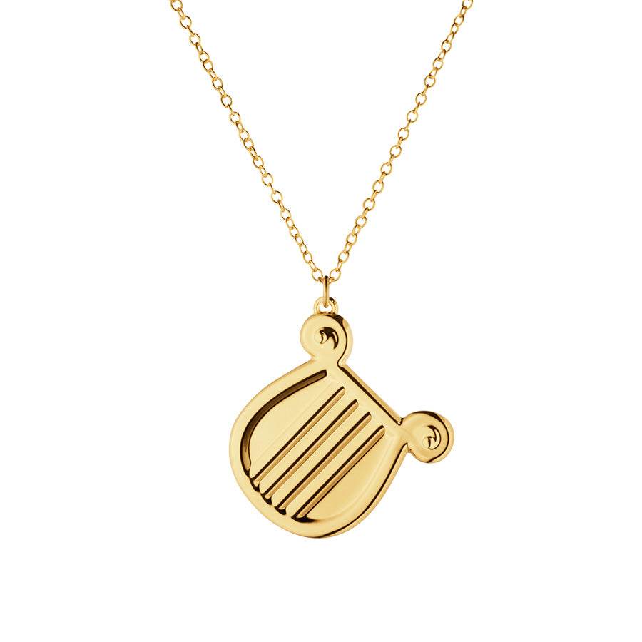 Georg Jensen juleornament 2026 formet som en harpe i gullbelagt sinklegering