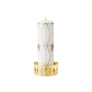 Georg Jensen kalenderlys 2026 med gullfargede motiver av kristtorn og tromme