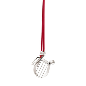 Georg Jensen juleornament 2026 formet som en harpe med kristtornkvist i palladiumbelagt messing