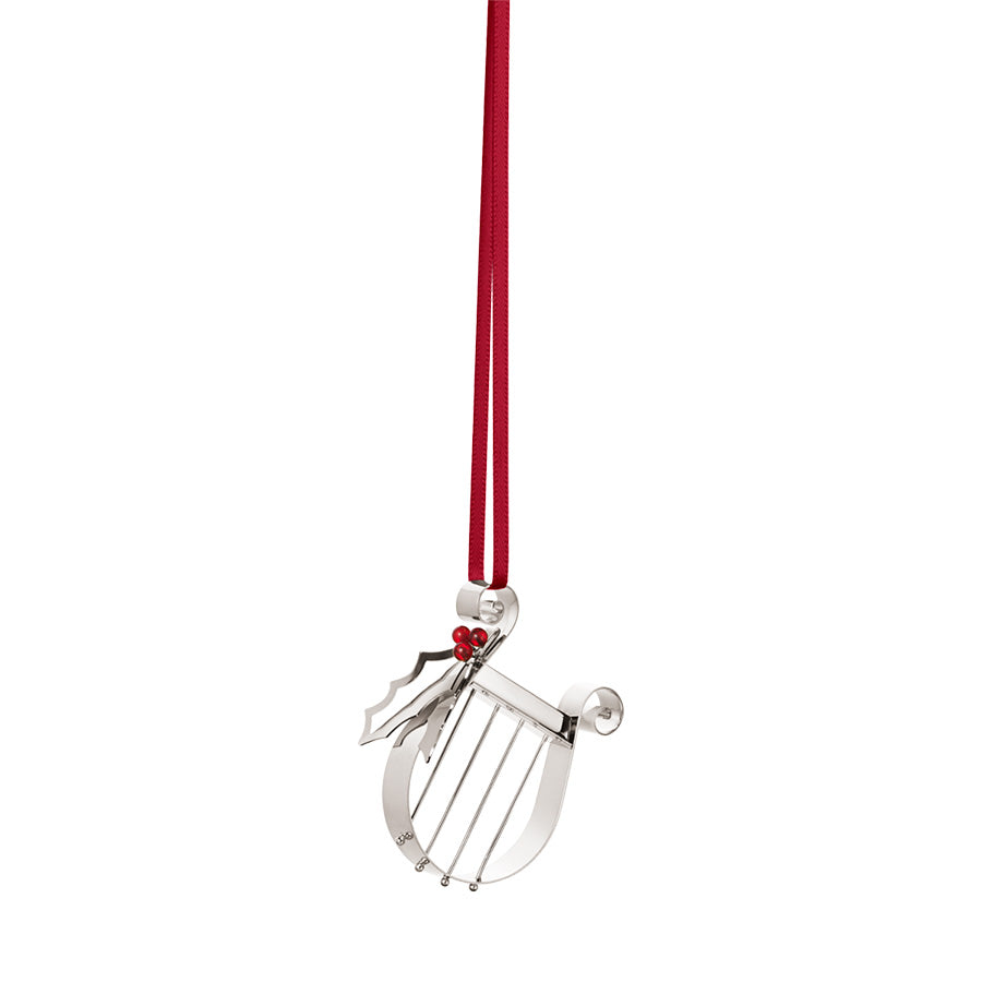 Georg Jensen juleornament 2026 formet som en harpe med kristtornkvist i palladiumbelagt messing