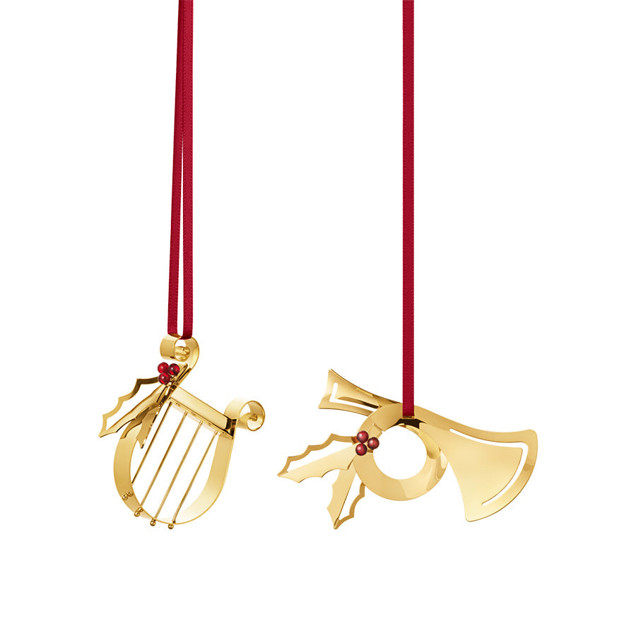 Georg Jensen juleornamentsett 2026 med posthorn og harpe i 18 kt forgylt messing