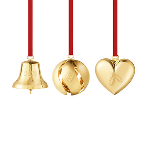 Georg Jensen ornamentsett 2026 med juleklokke, julekule og julehjerte i 18 kt forgylt messing