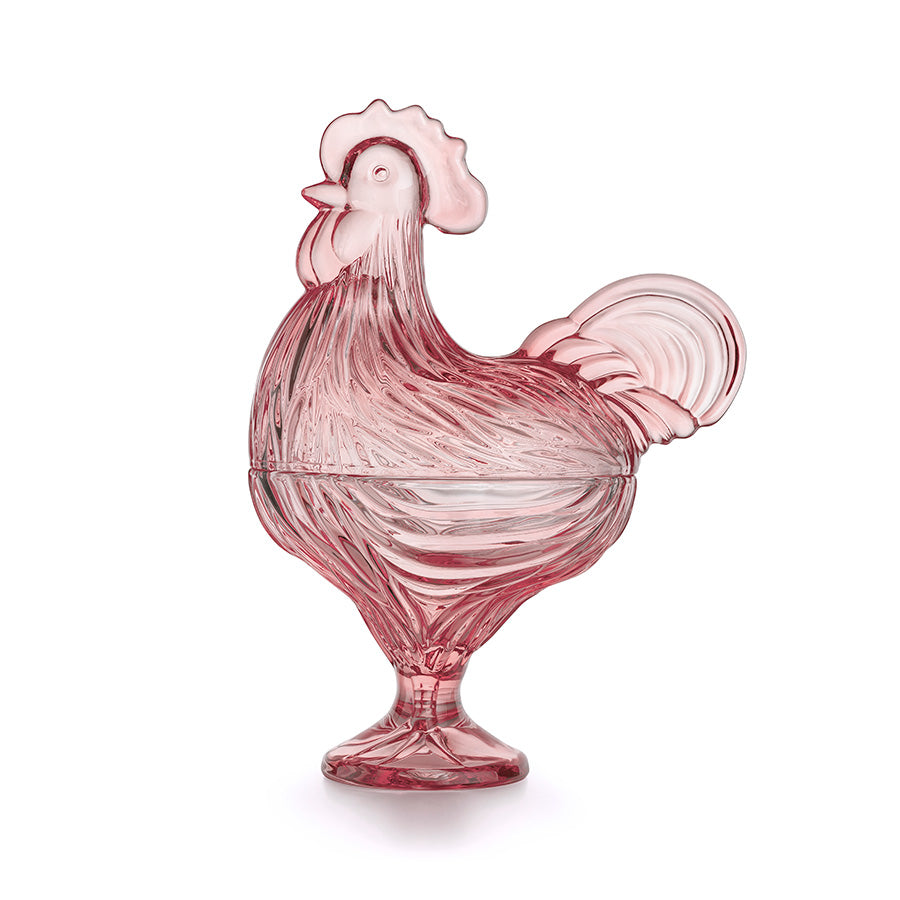 Rosa glasshane fra Hadeland Glassverk, en dekorativ skål med klassisk haneform, perfekt som pynt eller oppbevaring til påskegodt.