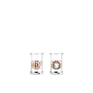 Holmegaard Christmas Juledrammeglass 2025 sett med to glass med nostalgiske julemotiver, designet av Jette Frölich, perfekt for å feire julen.