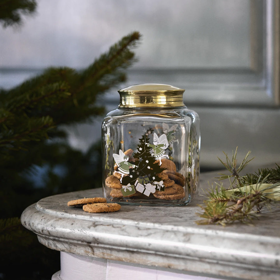 Julekakeglass fra Holmegaard Christmas fylt med pepperkaker og dekorert med julemotiv