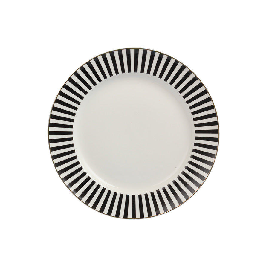 Nova Abby tallerken på 21 cm med svart-hvitt stripemønster og gullkant, ideell for elegant borddekking.