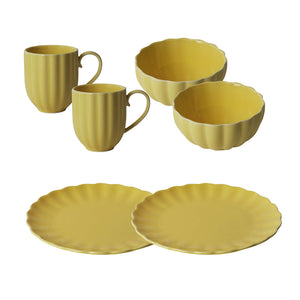 Nova Lilly Frokostservise gul til 2 personer, inkludert kopper, skåler og tallerkener i en varm gul farge, perfekt for moderne borddekking.