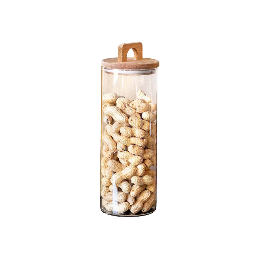 Oppbevaringsglass med lokk i akasietre fylt med peanøtter, 29 cm høyde, ideal for oppbevaring av tørrvarer.