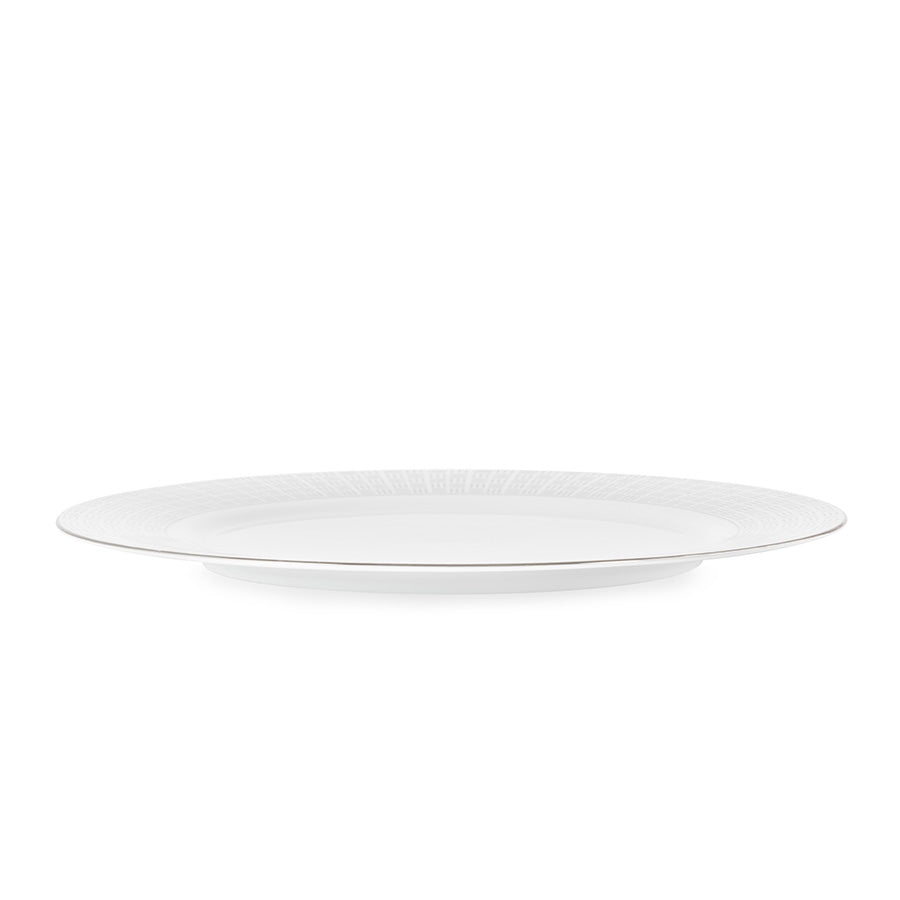 Porsgrund Porselænsfabrik Vivienne Platinum Tallerken 28cm, sidevisning som viser den tynne utførelsen og silkemyke glansen av benporselen.