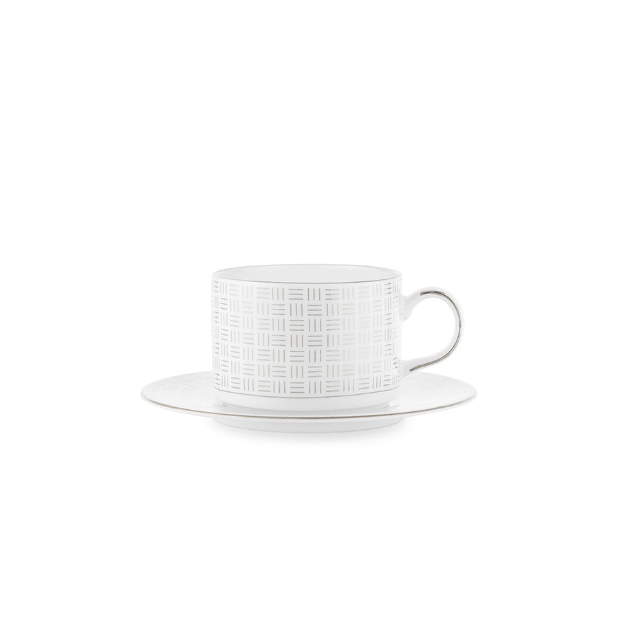 Porsgrund Porselænsfabrik Vivienne Tekopp med skål, elegant benporselen med platinadekor, perfekt for tepauser.