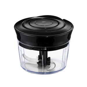 Christiania Glasmagasin minihakker med 400ml kapasitet, manuell trekk-mekanisme og sklisikker base, perfekt for hakking av løk, hvitløk og urter uten strøm.