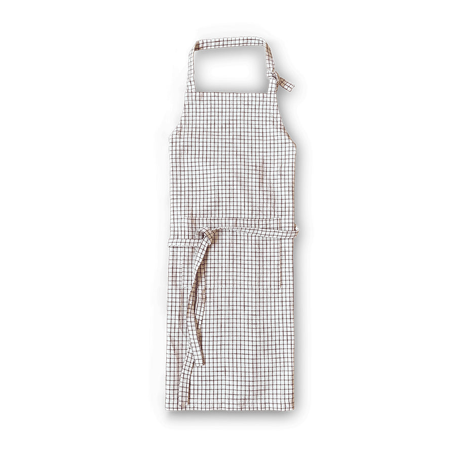 Rosendahl Forkle terracotta med moderne rutemønster, fremstilt av GRS-sertifisert resirkulert bomull og polyester, perfekt til kjøkkenbruk.