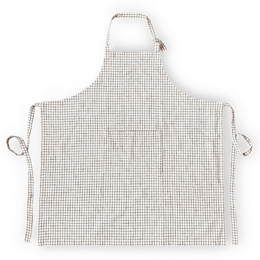 Rosendahl Forkle terracotta med justerbare bånd, vist fra foran, designet for komfort og stil mens du lager mat.