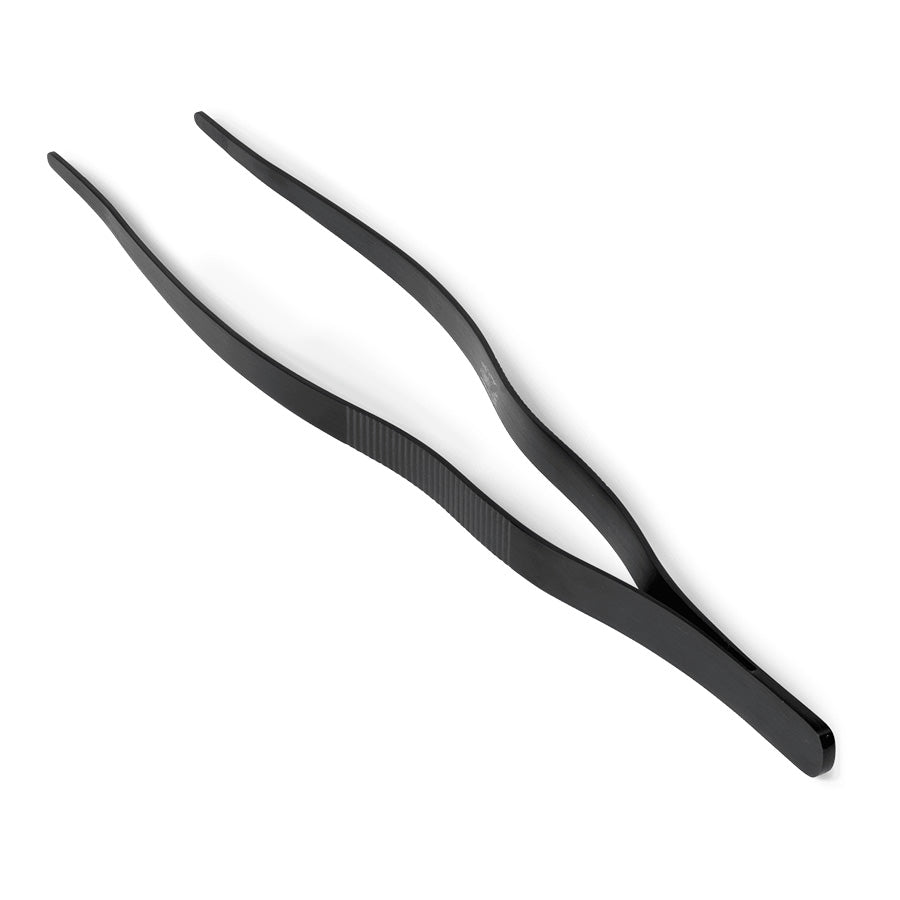 Rosendahl Rå stekepinsett i rustfritt stål med gunmetal-finish, designet for presis matlaging.