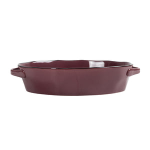 Burgunder ildfast form oval 38 cm med bølgete kanter, perfekt for servering av varme retter.
