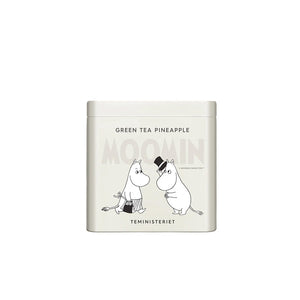 Teministeriet Moomin Grønn Te Ananas i en elegant, lys grå boks med Moomin-karakterer, perfekt for te-entusiaster.