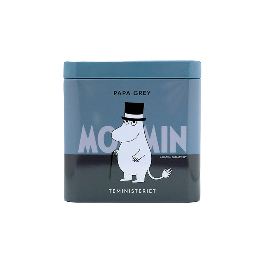 Teministeriet Moomin Mummipappa Sort Te i elegant blå og grå pakke med Mummipappa i flosshatt, perfekt som gave til te-elskere.