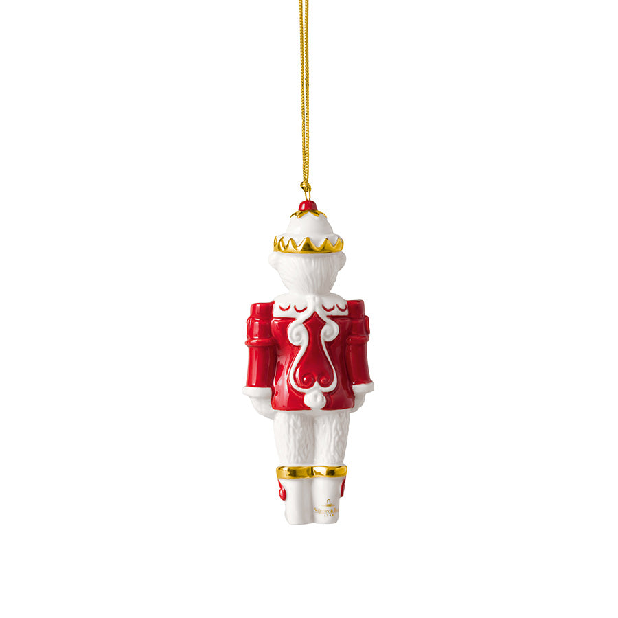 Baksiden av Christmas Classics nøtteknekker-ornament med rødt jakketøy og gullfargede detaljer