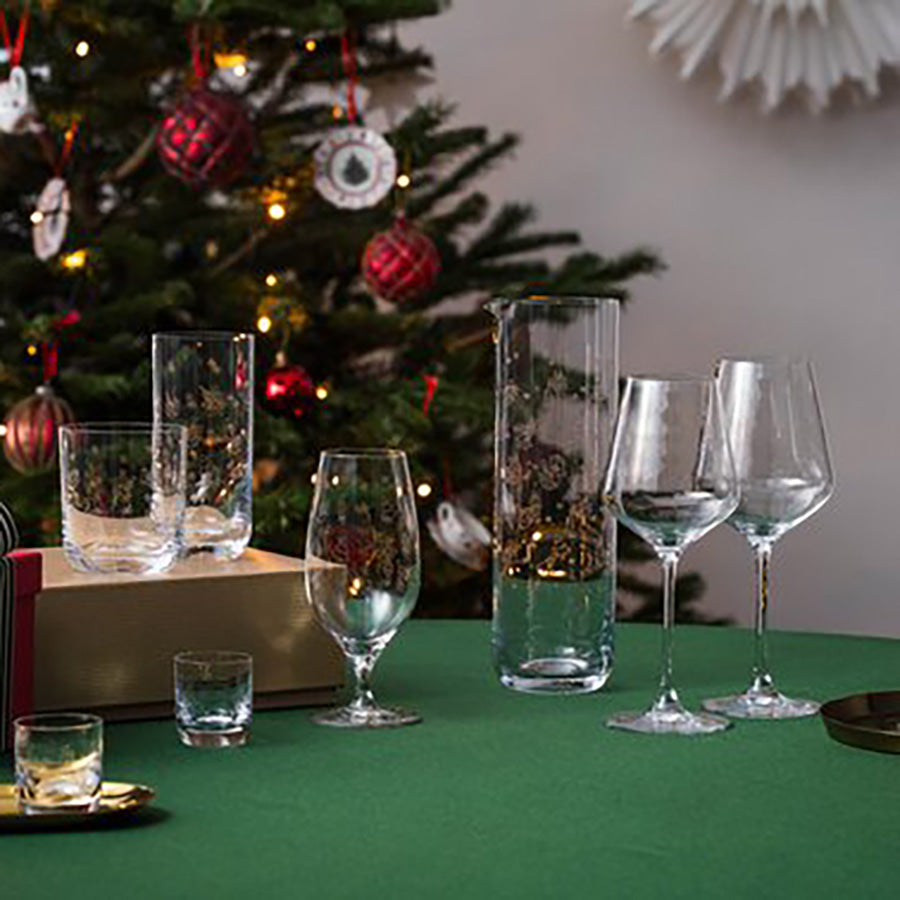 Elegant Toy's Delight glassmugge i klart glass sammen med juleglass på festlig julebord