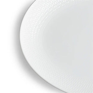 Detalj av Wedgwood Gio ovalt serveringsfat 30cm, viser den elegante teksturen og finishen.