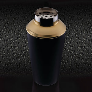 Nærbilde av Barcraft cocktailshaker i matte svart med gullfinish, ideell for å lage stilige cocktails.