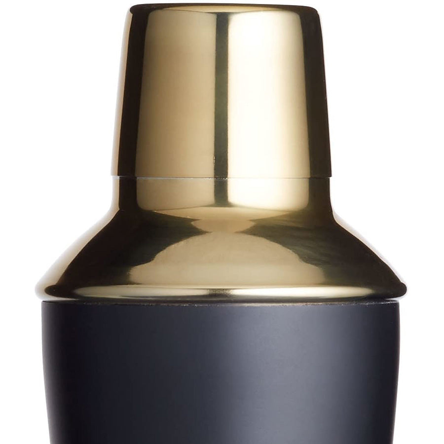 Detaljert utsikt av toppen av Barcraft cocktailshaker med gulldeksel, perfekt for cocktailmixing.