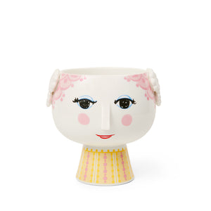 Lekker Bjørn Wiinblad potteskjuler med ansikt, dekorert med håndmalte detaljer i rosa og gult, perfekt for urter eller små blomster.