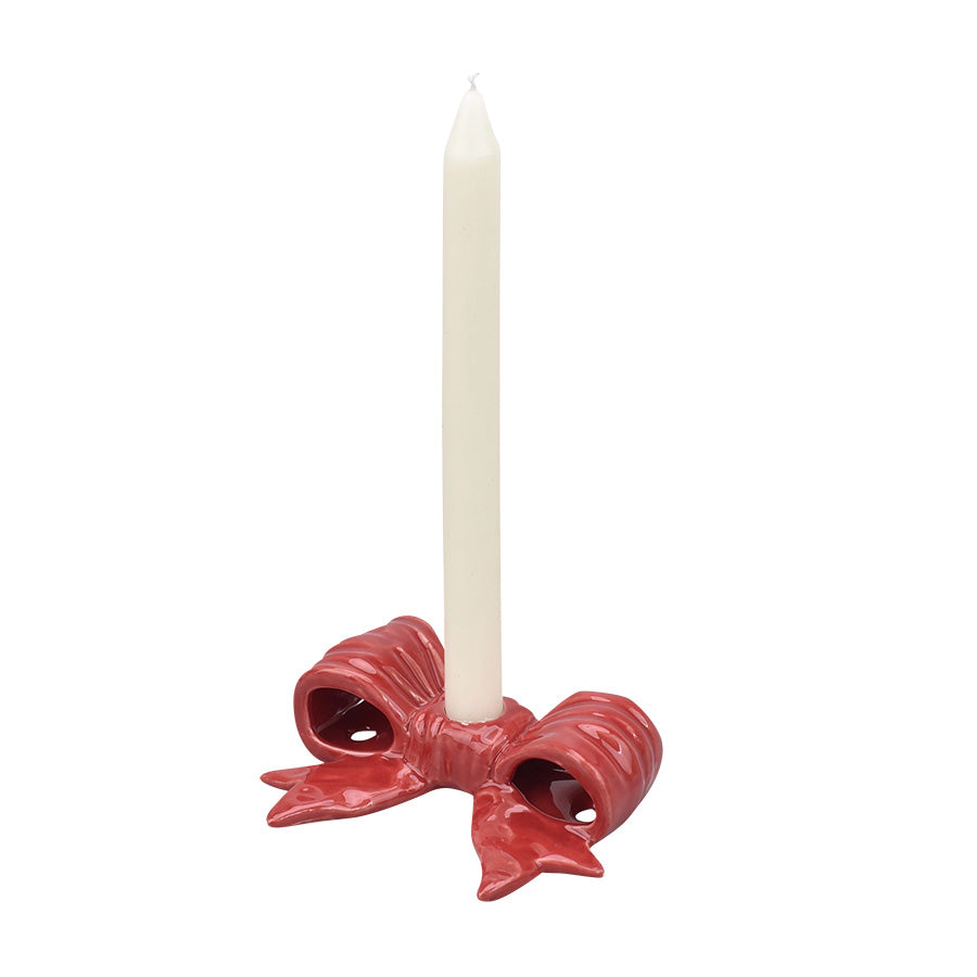 Rød lysestake formet som en julesløyfe i steingods fra Christiania Glasmagasin, 10,5 cm