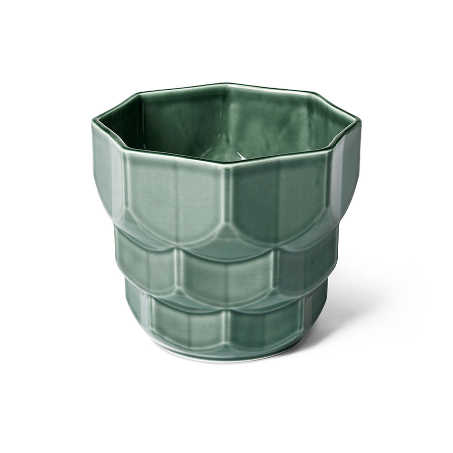 Blomsterpotte fra Dottir Nordic Design i grangrønn, med en elegant og moderne design, perfekt for små planter.