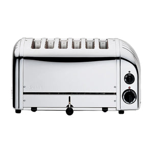 Dualit Classic brødrister i rustfritt stål med seks brede spalter, ideell for store frokoster, håndmontert i England for varig kvalitet.