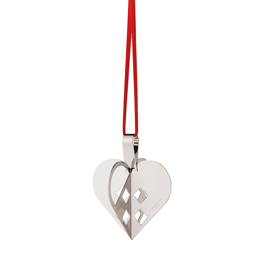 Georg Jensen juleornament hjerte i palladiumbelagt messing med rødt silkebånd, elegant design som kombinerer nostalgi og modernitet.