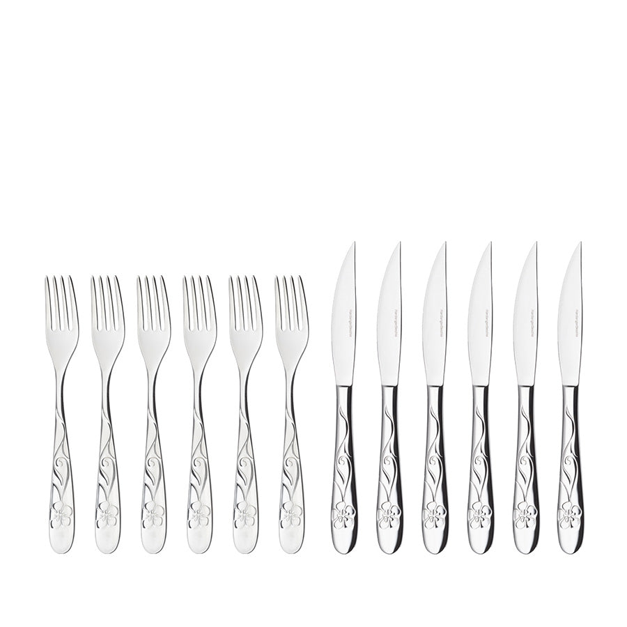 Bestikksett fra Hardanger Bestikk med 6 spisegafler og 6 biffkniver i elegant design, perfekt for middagsselskap.
