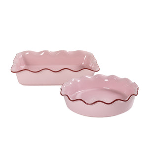 Love Collection Ildfaste Former 2stk: To elegante, rosa ildfaste former med bølgete kant, perfekte for servering og baking.