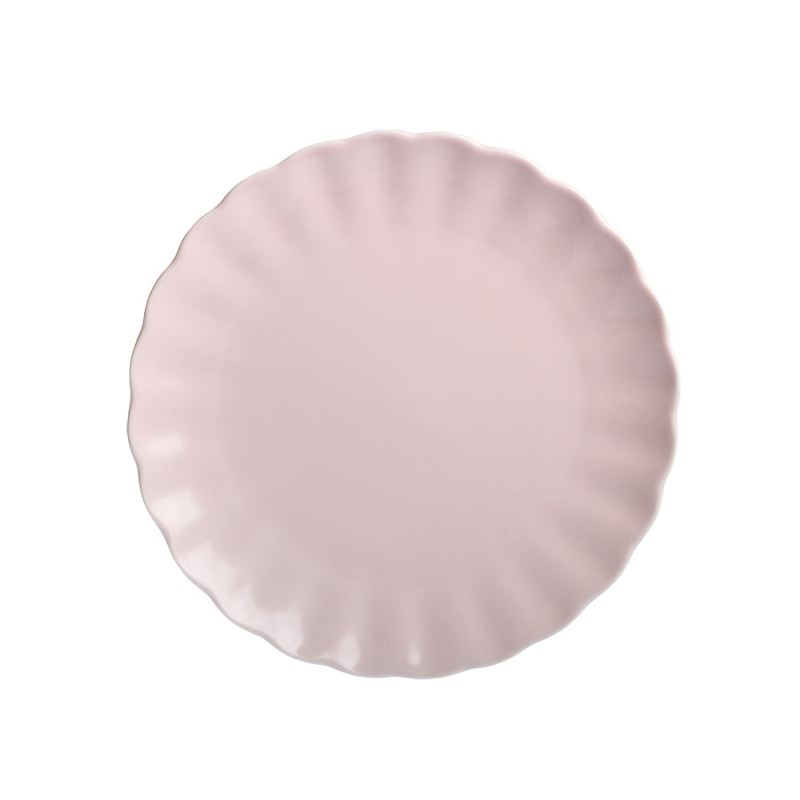 Nova Lilly tallerken på 21 cm i dus rosa farge, elegant bølget form, perfekt til små måltider.