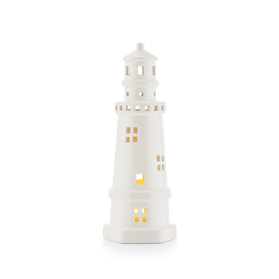Elegant hvit fyrtårn LED-lys fra Porsgrunds Porselænsfabrik, designet med detaljerte vinduer som gir et varmt, innbydende lys.